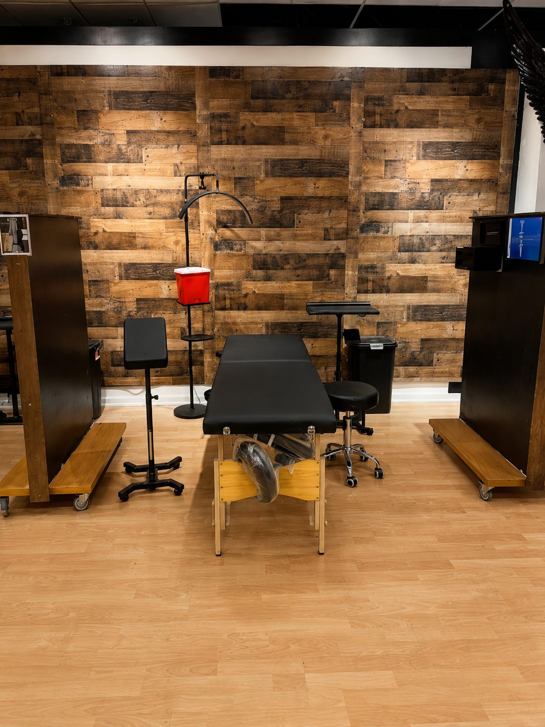 Station 3 — reclaimed-wood wall with dividers